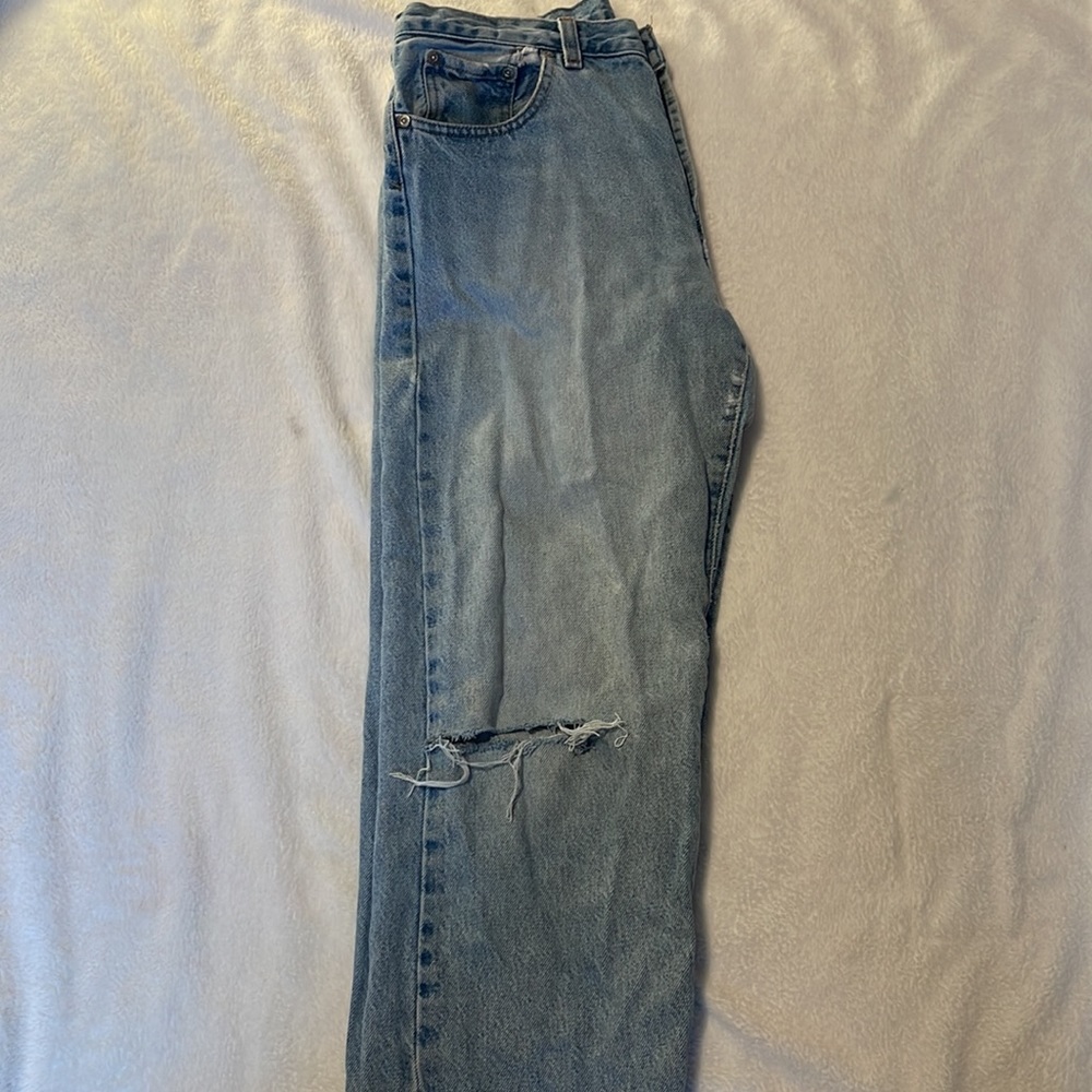 Mom jeans with 2 holes at the knees